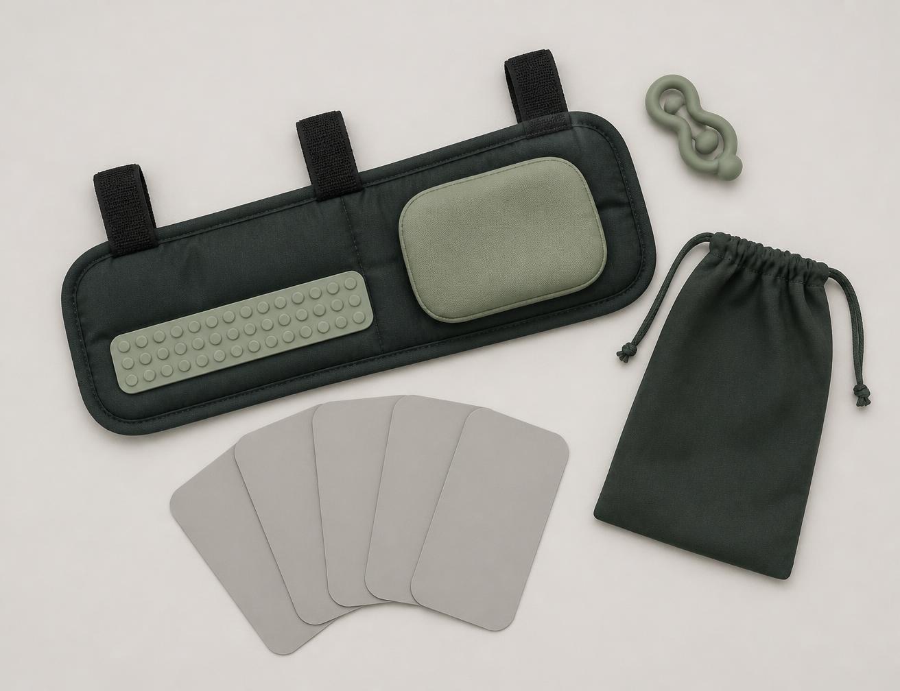 QuietCart attachment shown with its tactile strip, squeeze pad, fidget, carry pouch and CalmCue cards